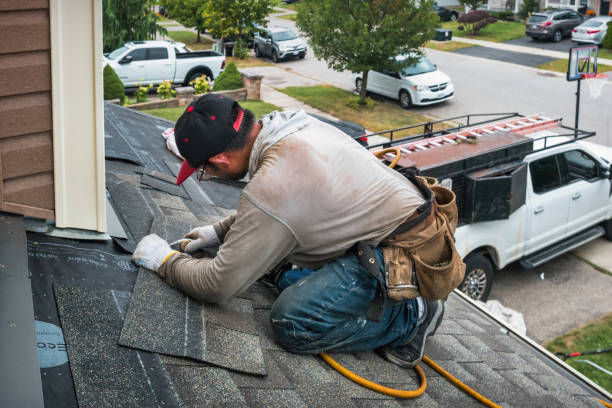Professional Roof Repair technician working in Hamden, CT